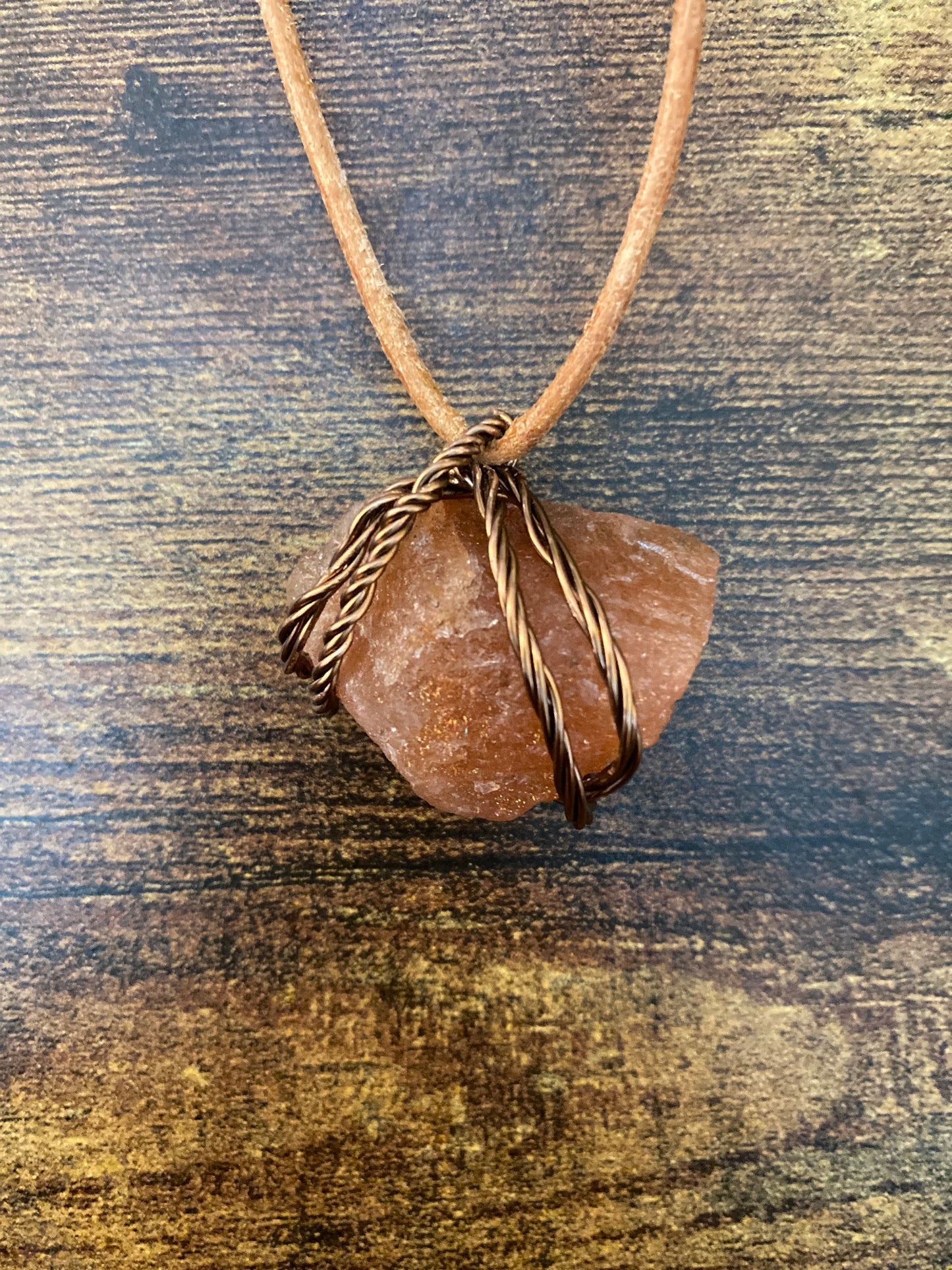 Sunstone Necklace Intertwined with Copper Strand